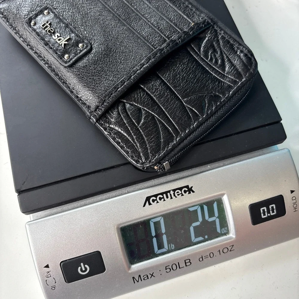 The Sak Black Leather Zip Card Holder Keychain Wallet ID Window Embossed Leaf